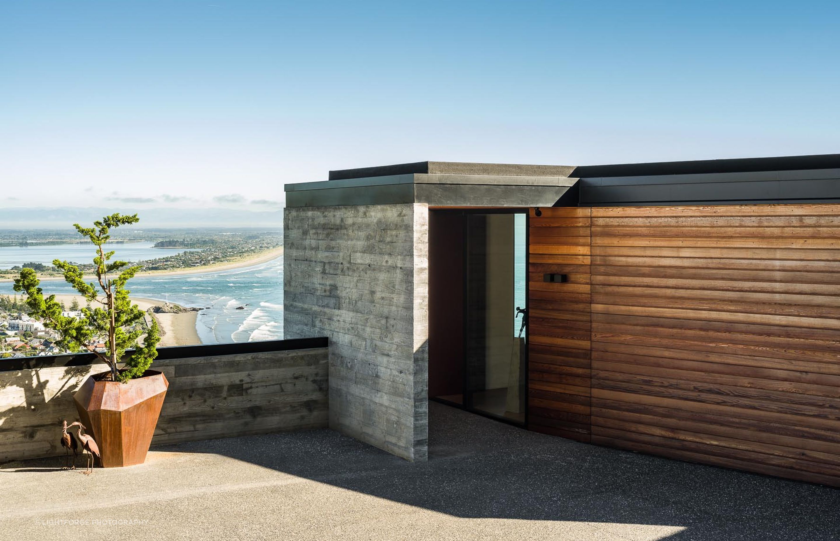 A garage and home office are located on the home's top level.