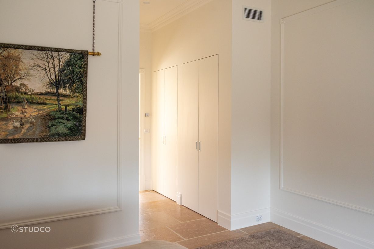 EzyJamb SRC door frames offer visual space to the narrow path leading through to the bedroom