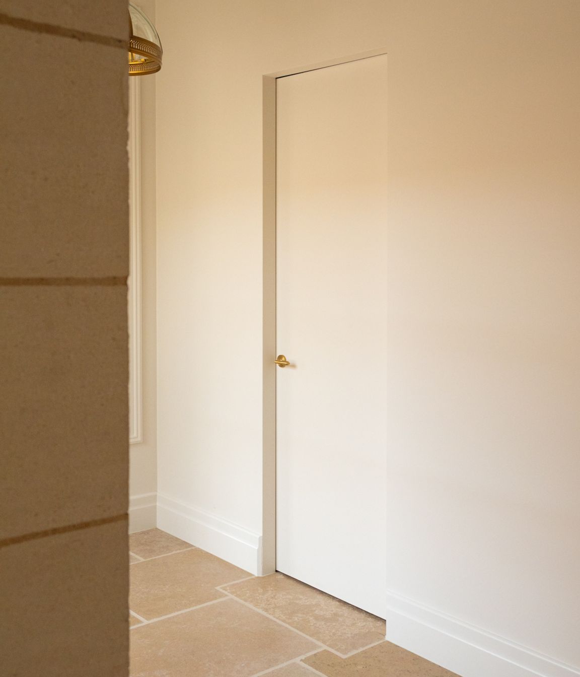 The SRC frame brings a clean line perimeter to this hallway opening that comfortably blends into its surroundings.