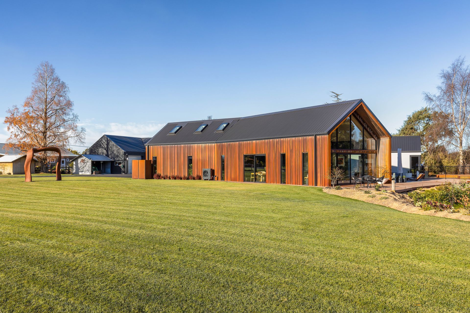 As well as the established gardens, the house has a large grassed section beside it.