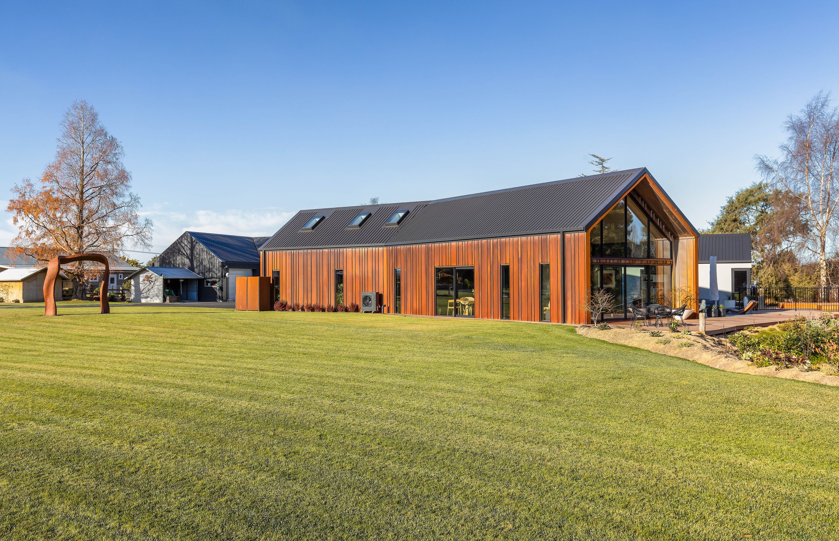 As well as the established gardens, the house has a large grassed section beside it.