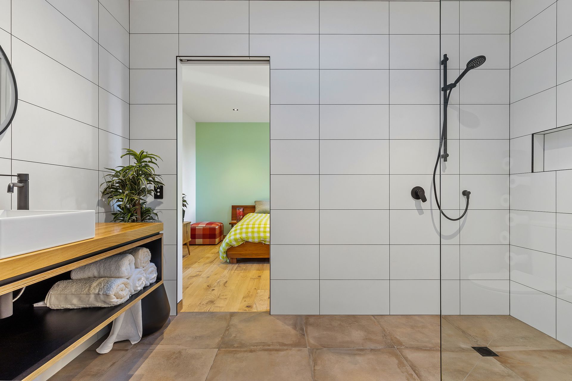 A large bathroom services the bedroom wing.