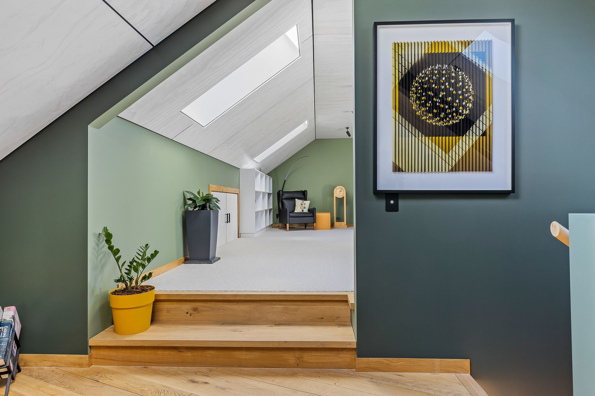 An office area is found in the mezzanine level, above the garage.