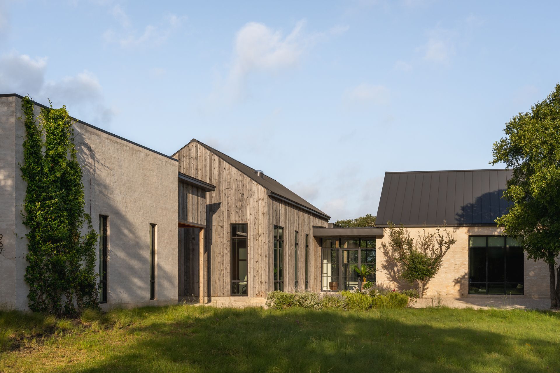 Mid-century-modern-rustic-custom-home-front-exterior.jpg