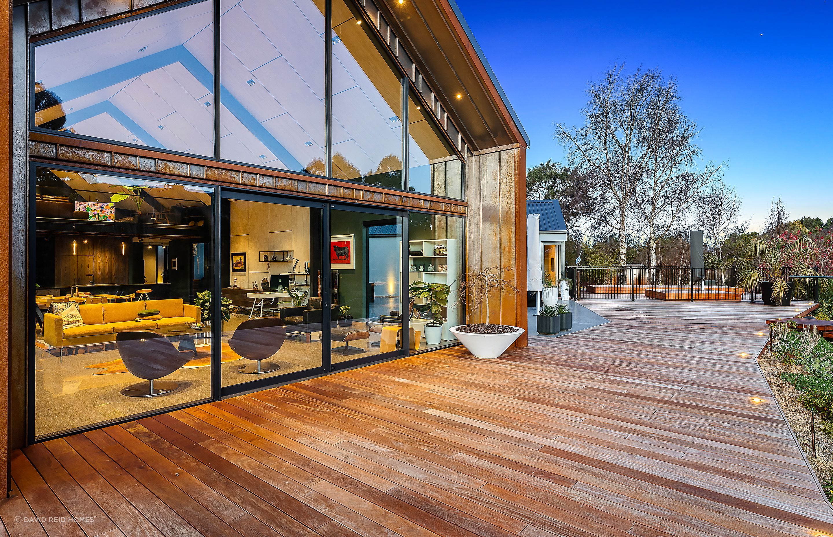 The home's corten cladding will age and patina over time and continue to complement the surrounding natural landscape.