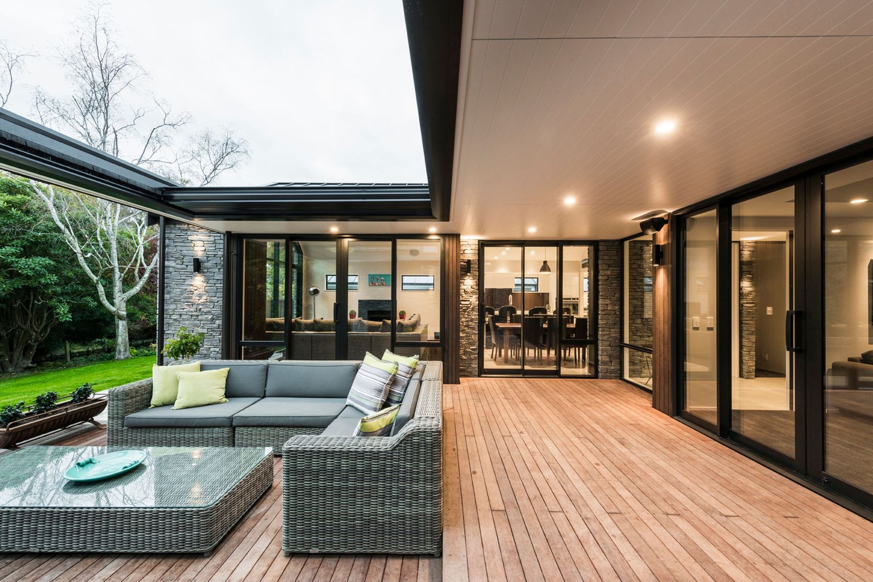 A view of the kitchen/dining as seen from the outdoor entertainment area.