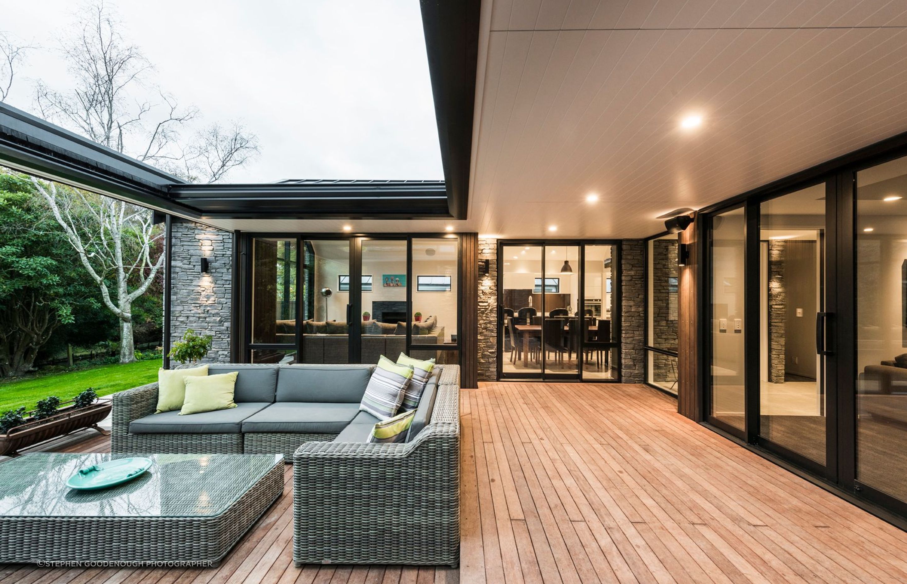 A view of the kitchen/dining as seen from the outdoor entertainment area.