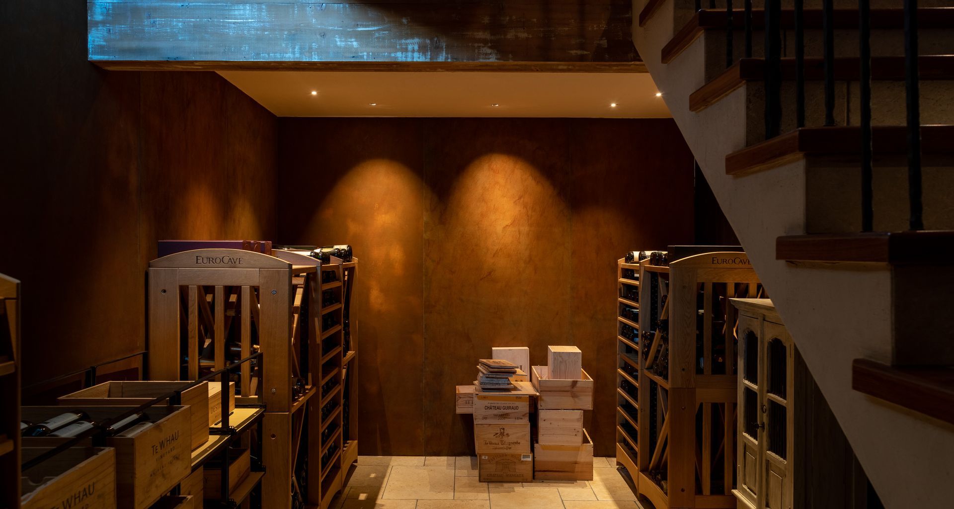 Switch Lighting Zela Tilt luminaires with a warm colour temperature were specified for this wine cellar