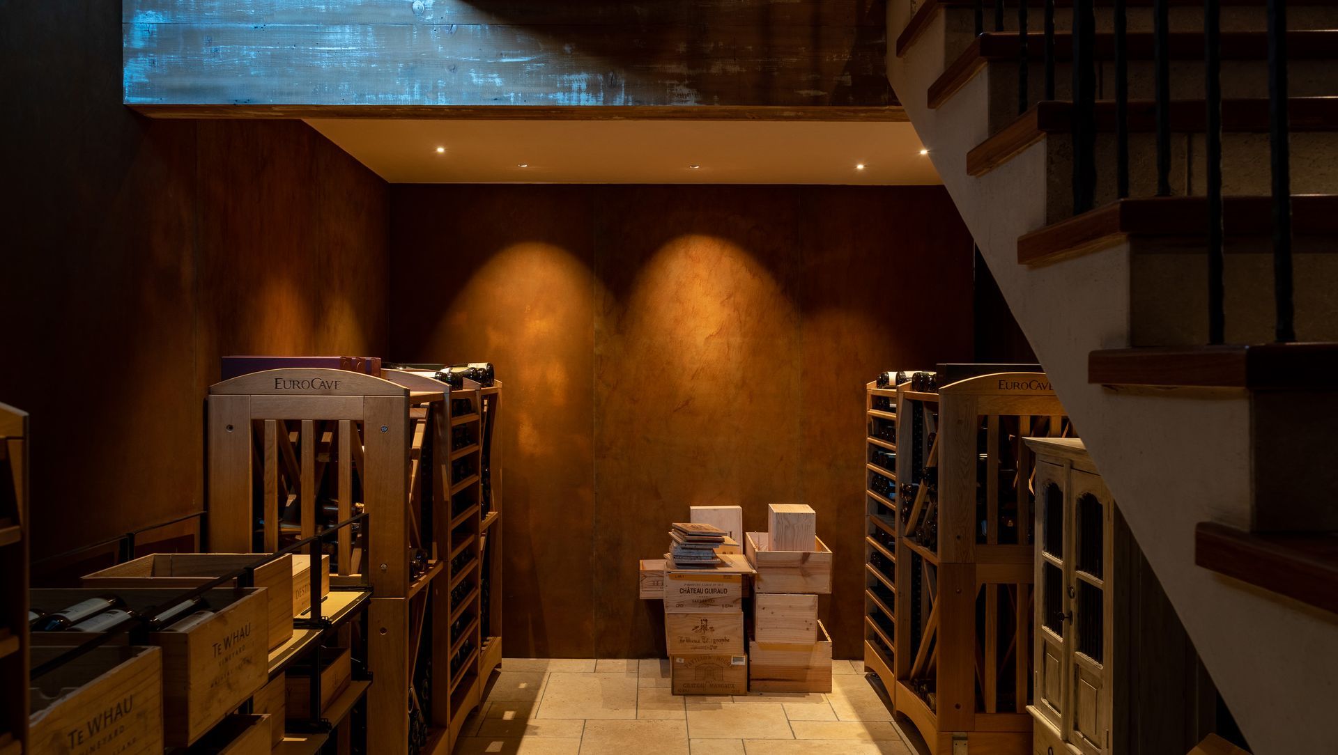 Switch Lighting Zela Tilt luminaires with a warm colour temperature were specified for this wine cellar
