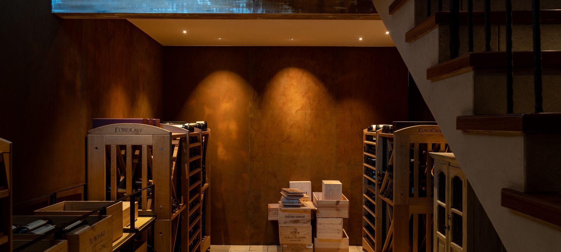 Switch Lighting Zela Tilt luminaires with a warm colour temperature were specified for this wine cellar
