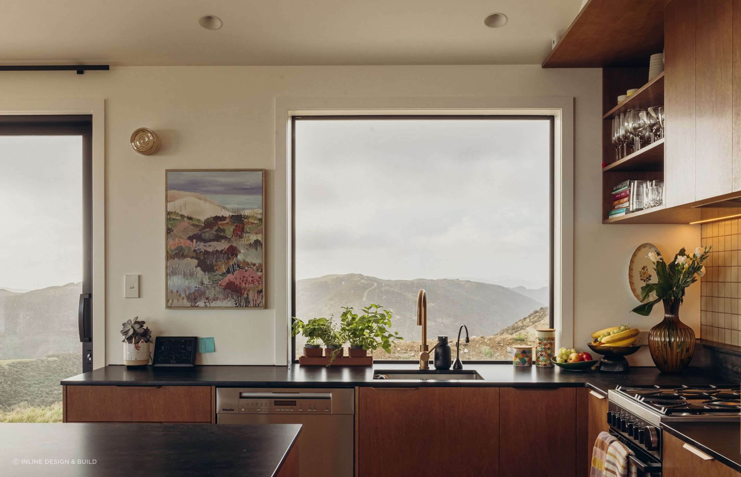 A central aim for this home was to create a sense of familiarity — a lived-in feel where everything feels considered and effortlessly placed. At the core is the kitchen and lounge: a welcoming, comfortable hub designed for both connection and quiet retreat.