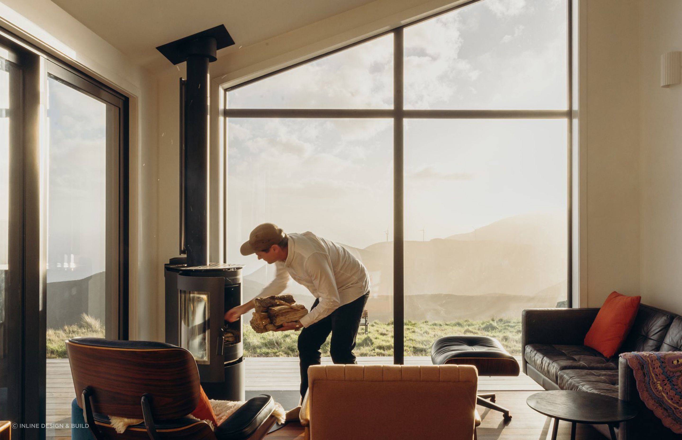 Framed by expansive windows overlooking the Cook Strait, this space is anchored by a roaring fire and ever-changing coastal views. Whether watching ferries glide past or weather sweep in from the south, this room offers a sense of calm and rhythm — a dynamic space that feels grounded, inviting, and deeply connected to its surroundings.