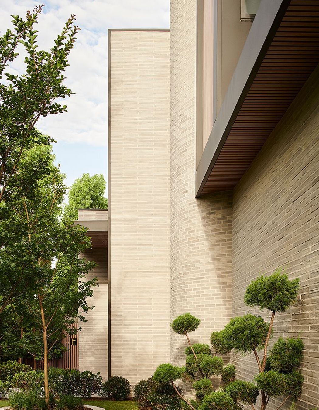 Petersen-bricks-Hawthron-Grove-curve-front-wall-high.jpg