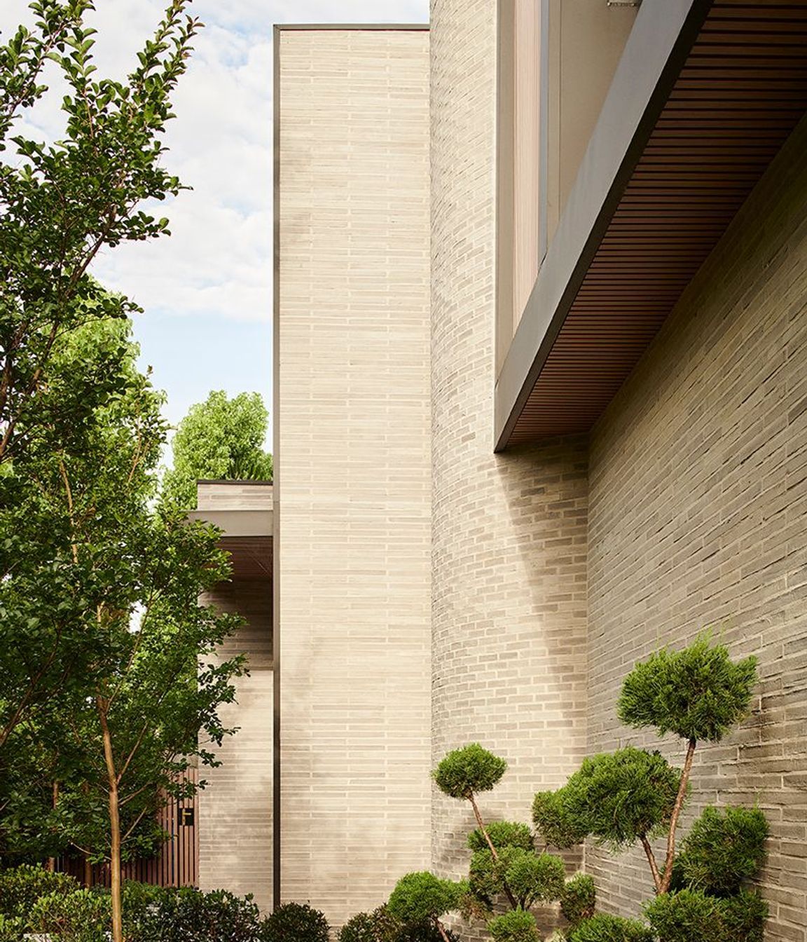 Petersen-bricks-Hawthron-Grove-curve-front-wall-high.jpg