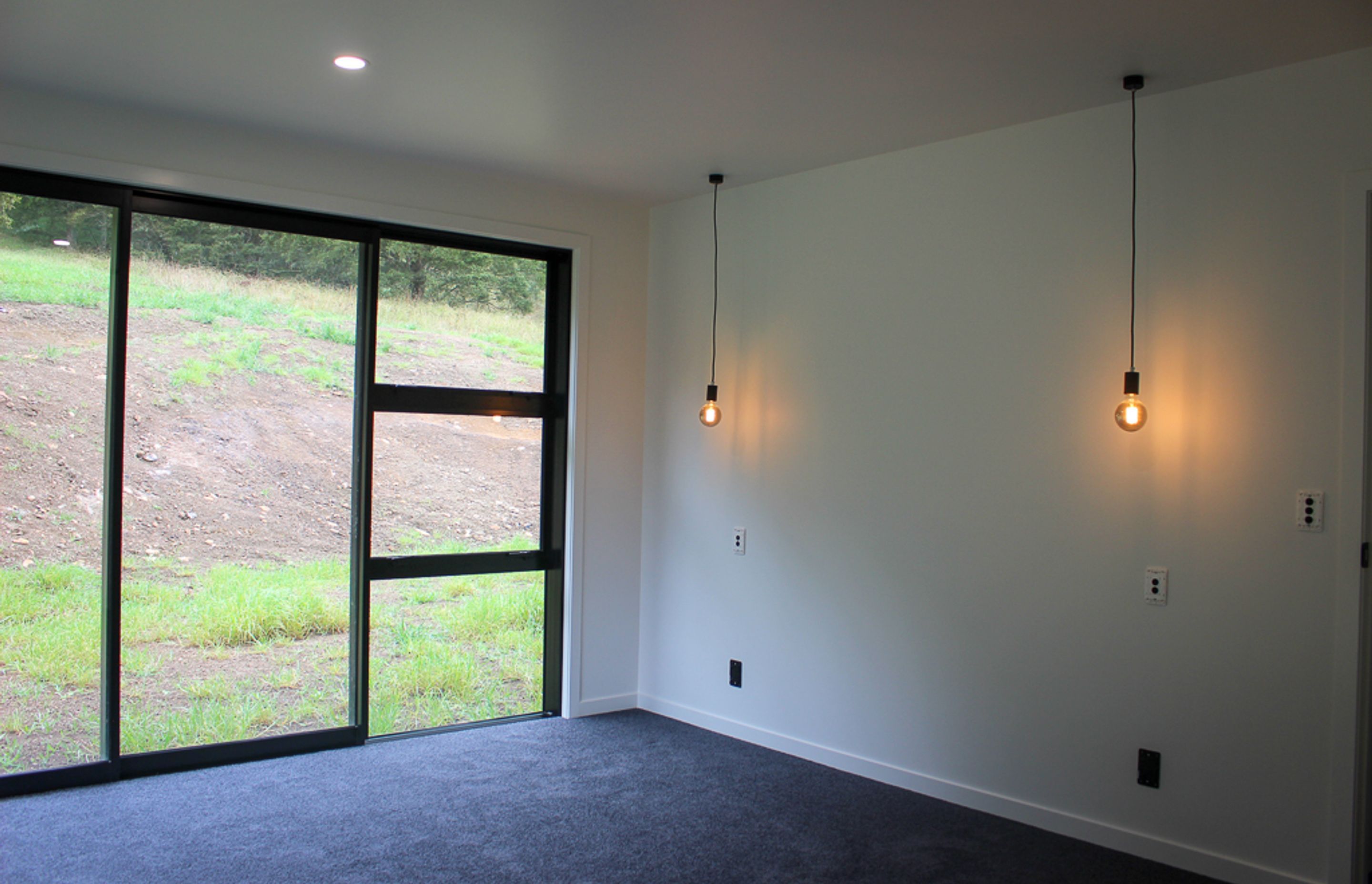 The bedrooms in the build have been kept contemporary and simple. Full sliding joinery, beautiful wool carpeting and lots of storage for this busy family
