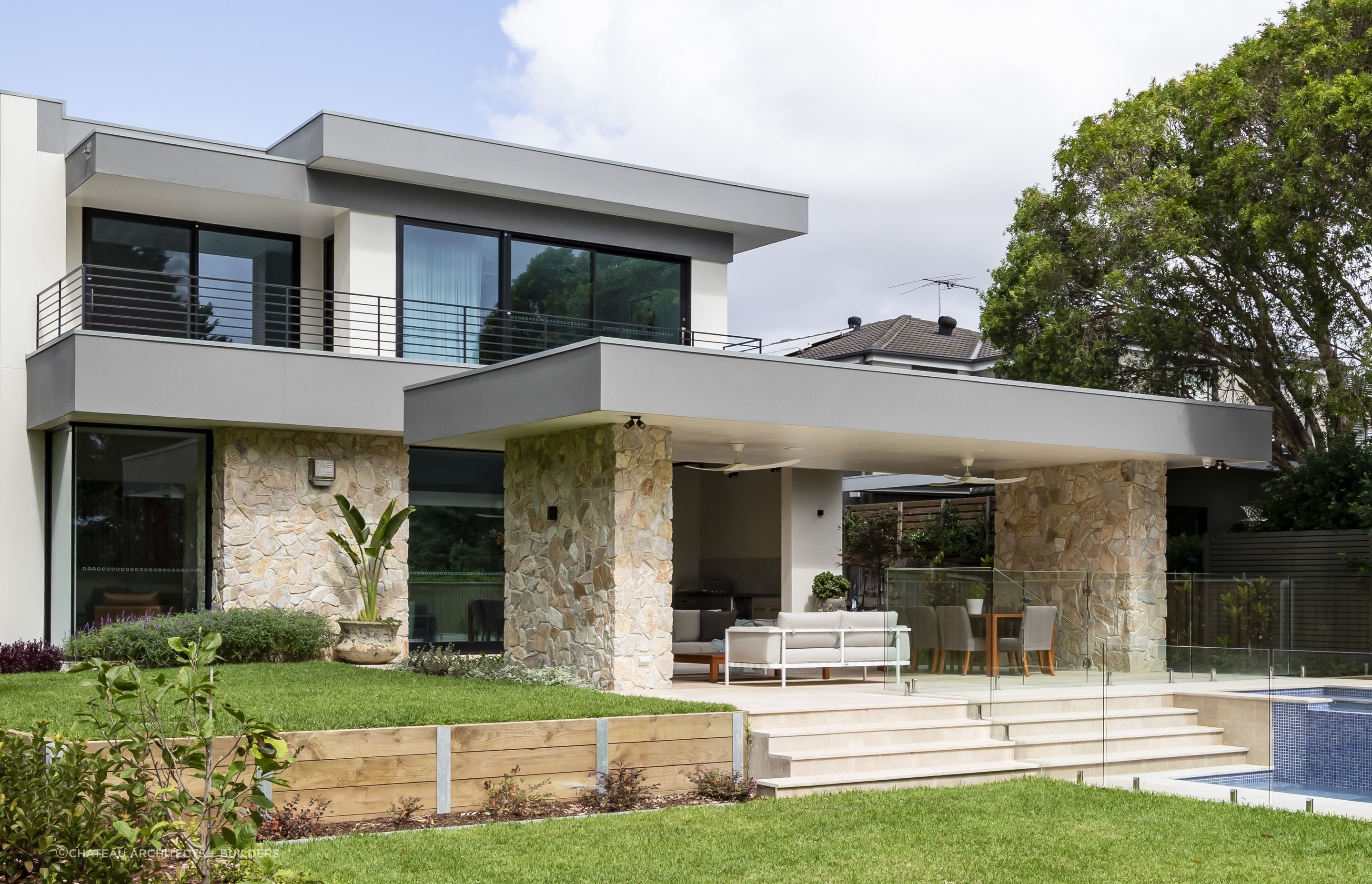 Lavarosa Limestone | Summit Wall Cladding | Chateau Architects + Builders | Crystal Pools | Green Coast Landscapers | Think Outside Gardens | One Four Interiors