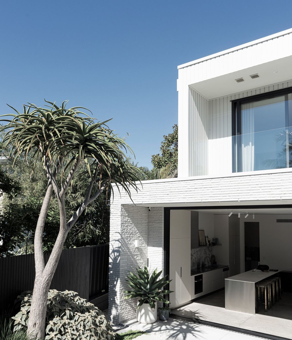 Newnham and Barry's property is one of only three or four homes in the country to use this split white brick.