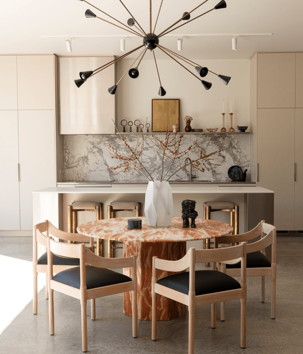 With an open floor plan and access to the courtyard, the kitchen and dining space is ideal for entertaining.
