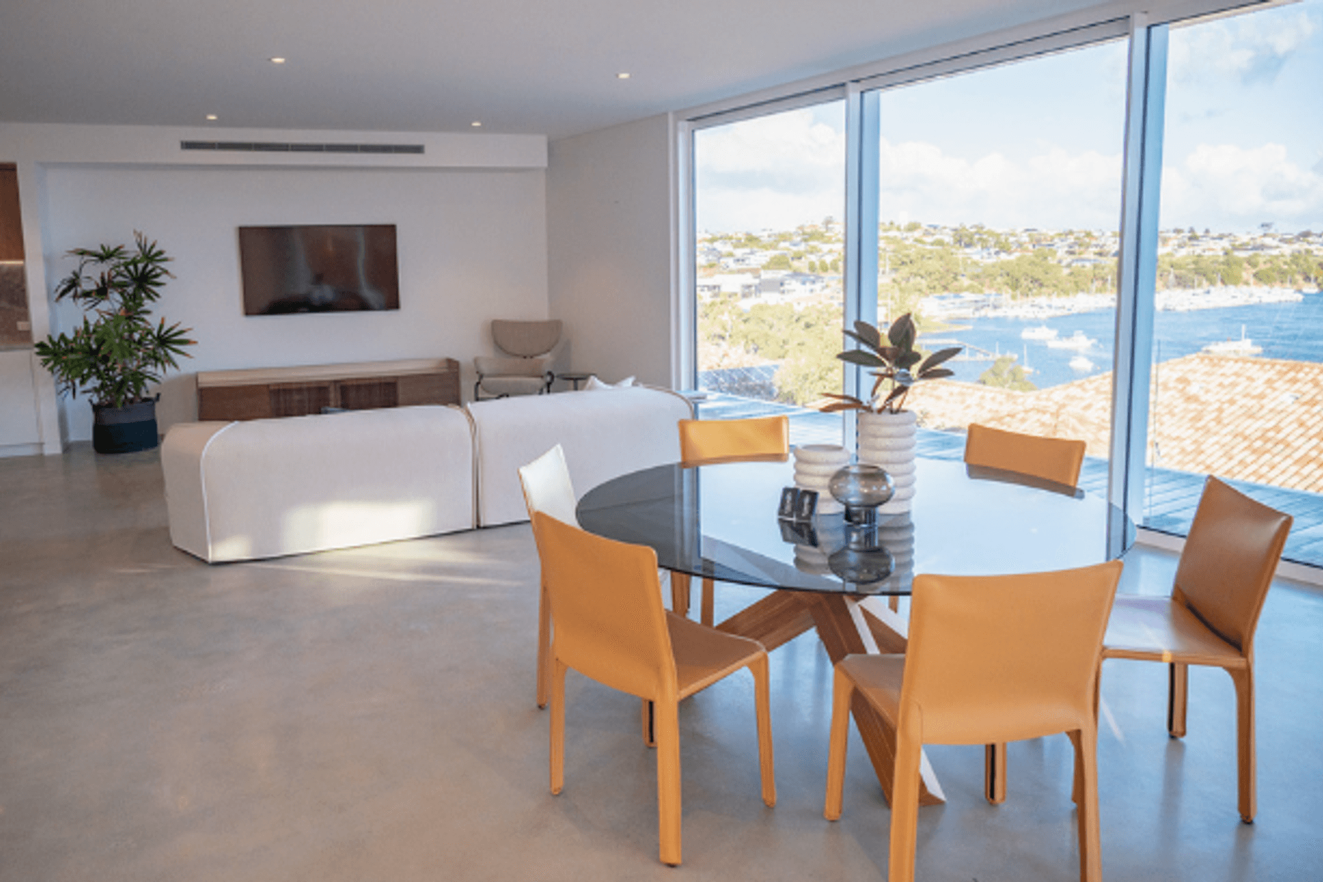 The warm, welcoming feel of the home is felt in the freeform design seen in the likes of the living room.