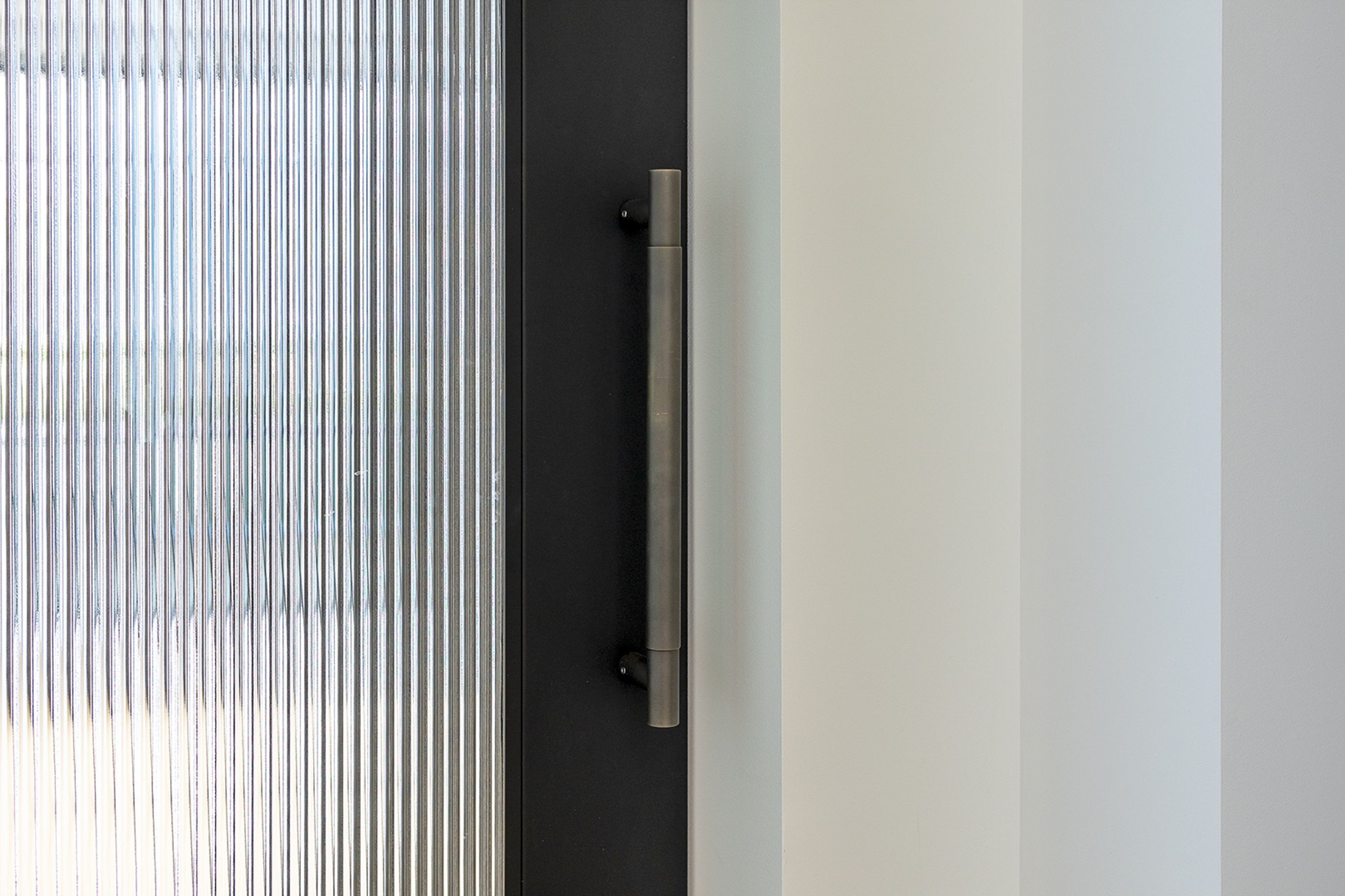 WAHNIDONZMadeVergeGNMilfordRBGrantStFlutedSteelDoorMelbourne1920x1080px.jpg