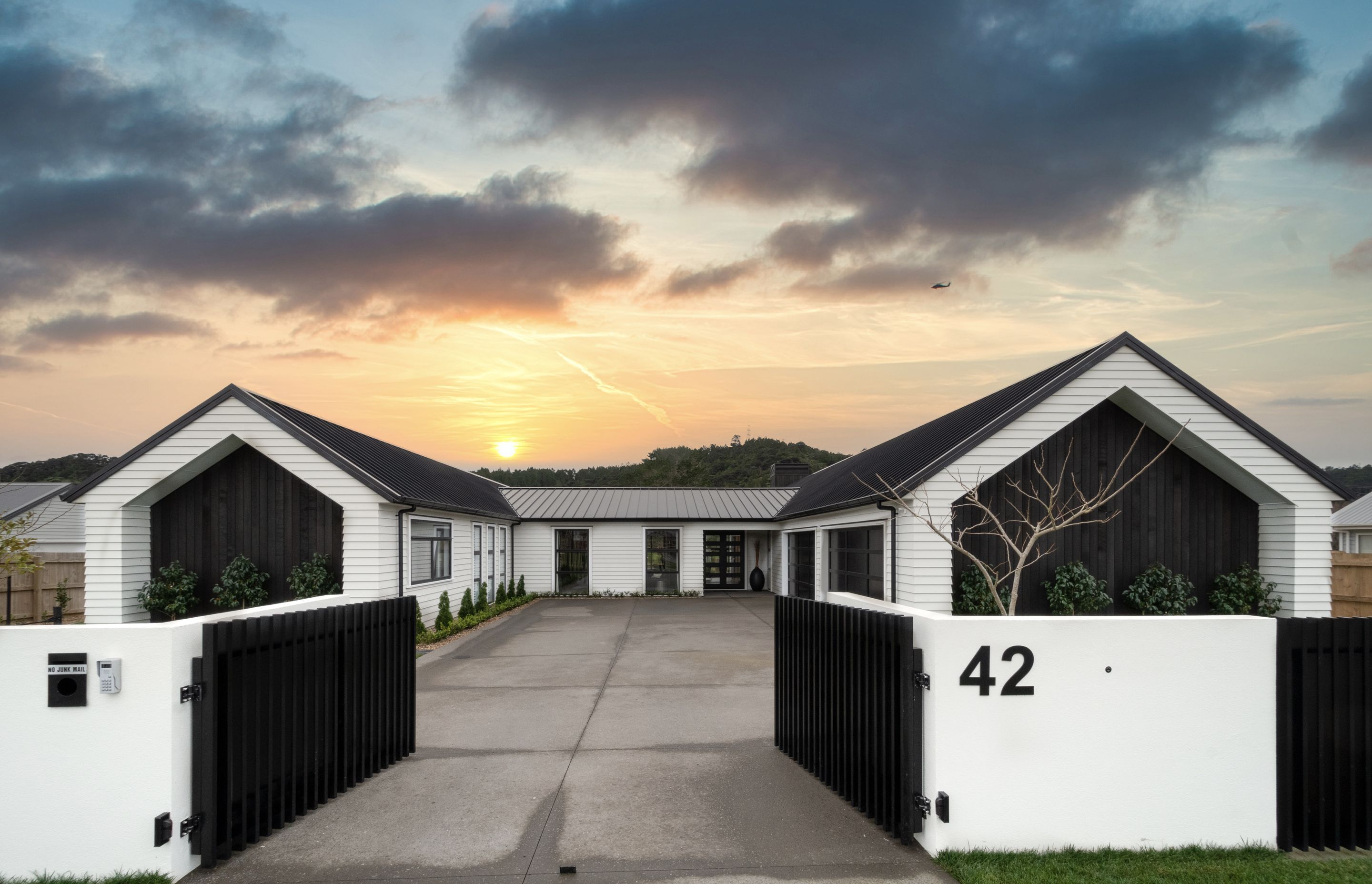 The homes sits within a spacious semi-rural lifestyle subdivision in Huapai.