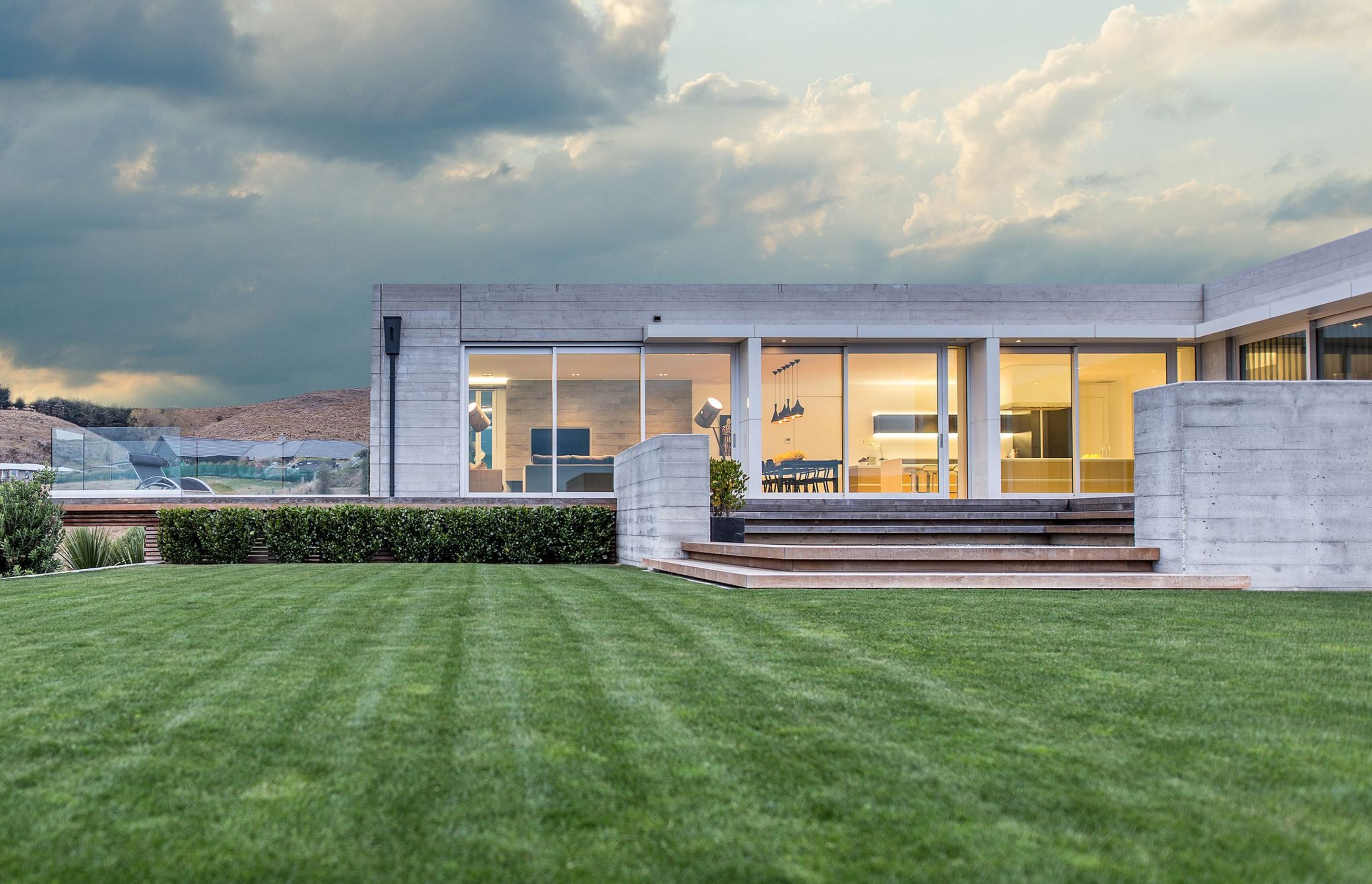 Landscaping was established at the same time the house was being built so that it would be sufficiently bedded in when the building was complete.