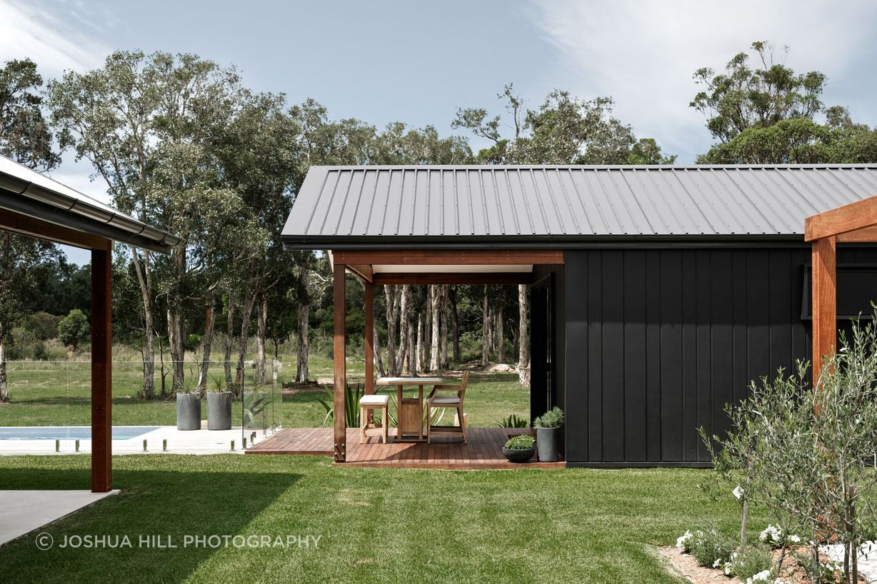 oblique-brushedconcrete-hardiefinetexture-exterior-modernfarmhouse-annabay-bakkerhomes-jameshardie-39.jpg
