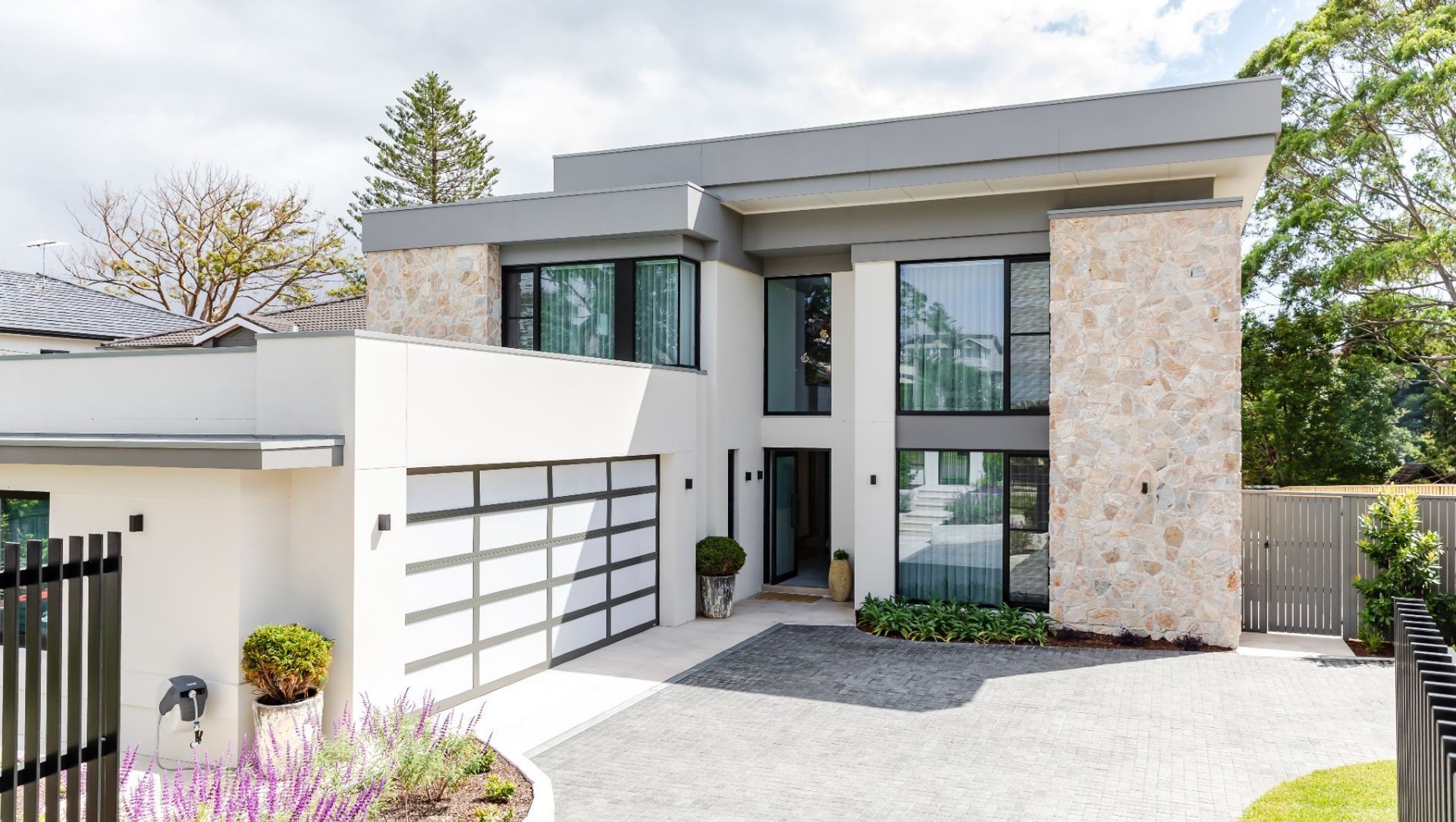 Summit Wall Cladding | Charcoal Cobblestones | Chateau Architects + Builders | Crystal Pools | Green Coast Landscapers | Think Outside Gardens | One Four Interiors