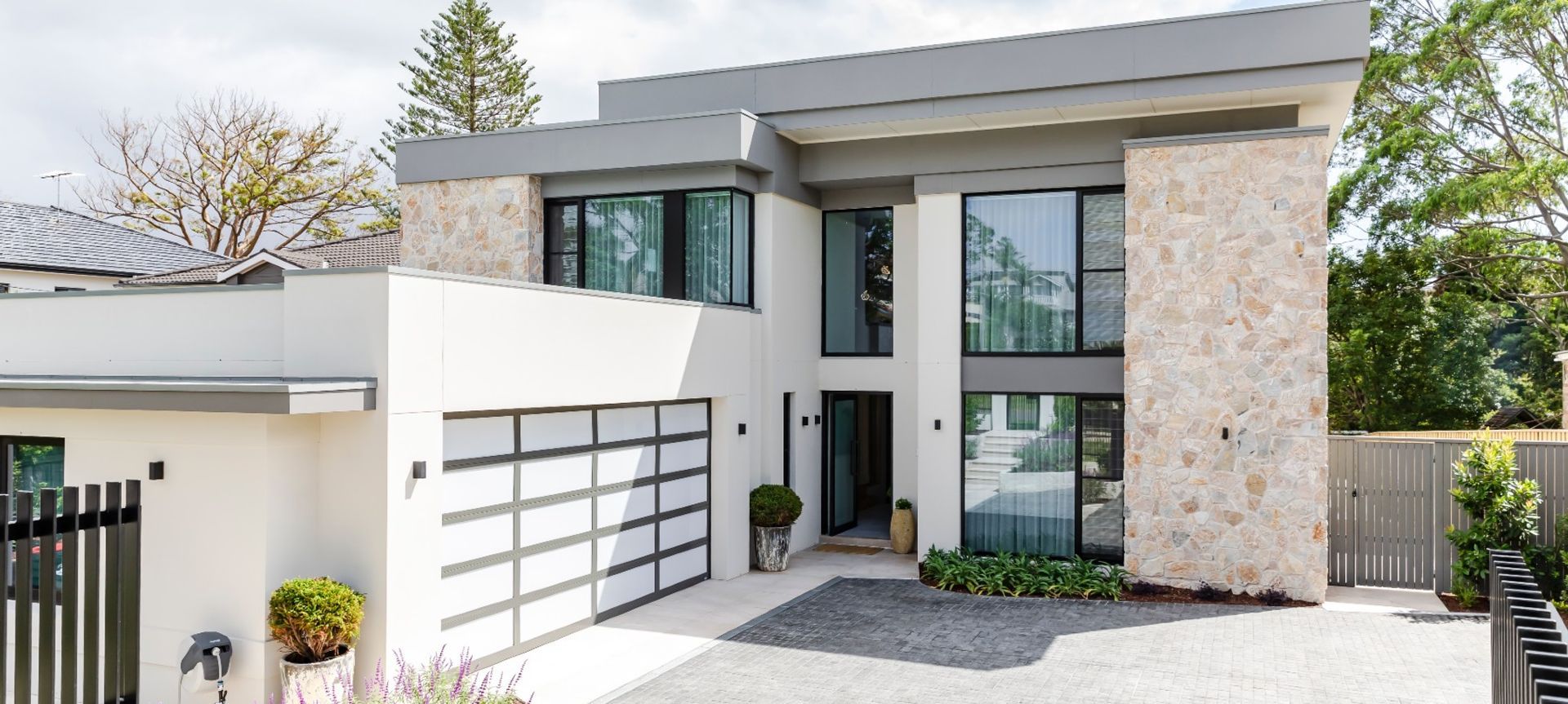 Summit Wall Cladding | Charcoal Cobblestones | Chateau Architects + Builders | Crystal Pools | Green Coast Landscapers | Think Outside Gardens | One Four Interiors