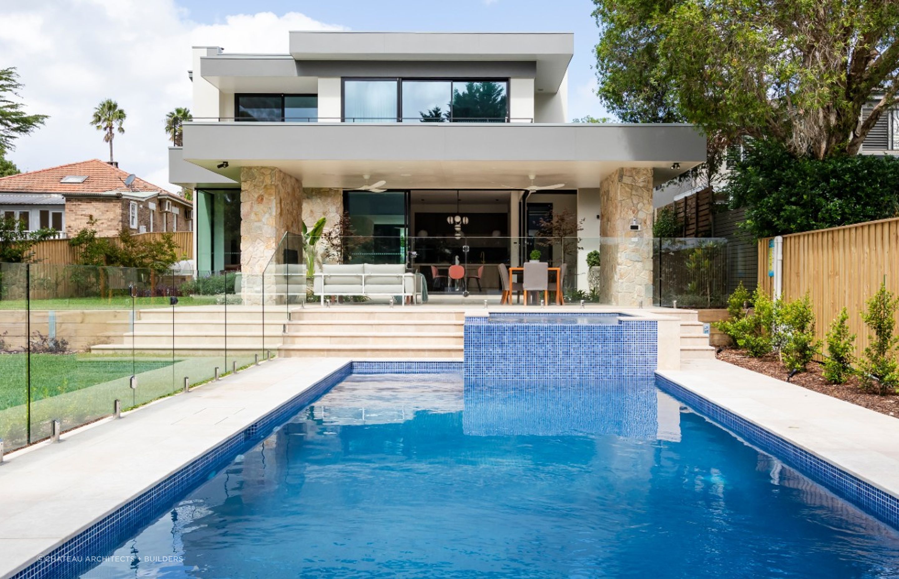 Lavarosa Limestone | Summit Wall Cladding | Chateau Architects + Builders | Crystal Pools | Green Coast Landscapers | Think Outside Gardens | One Four Interiors