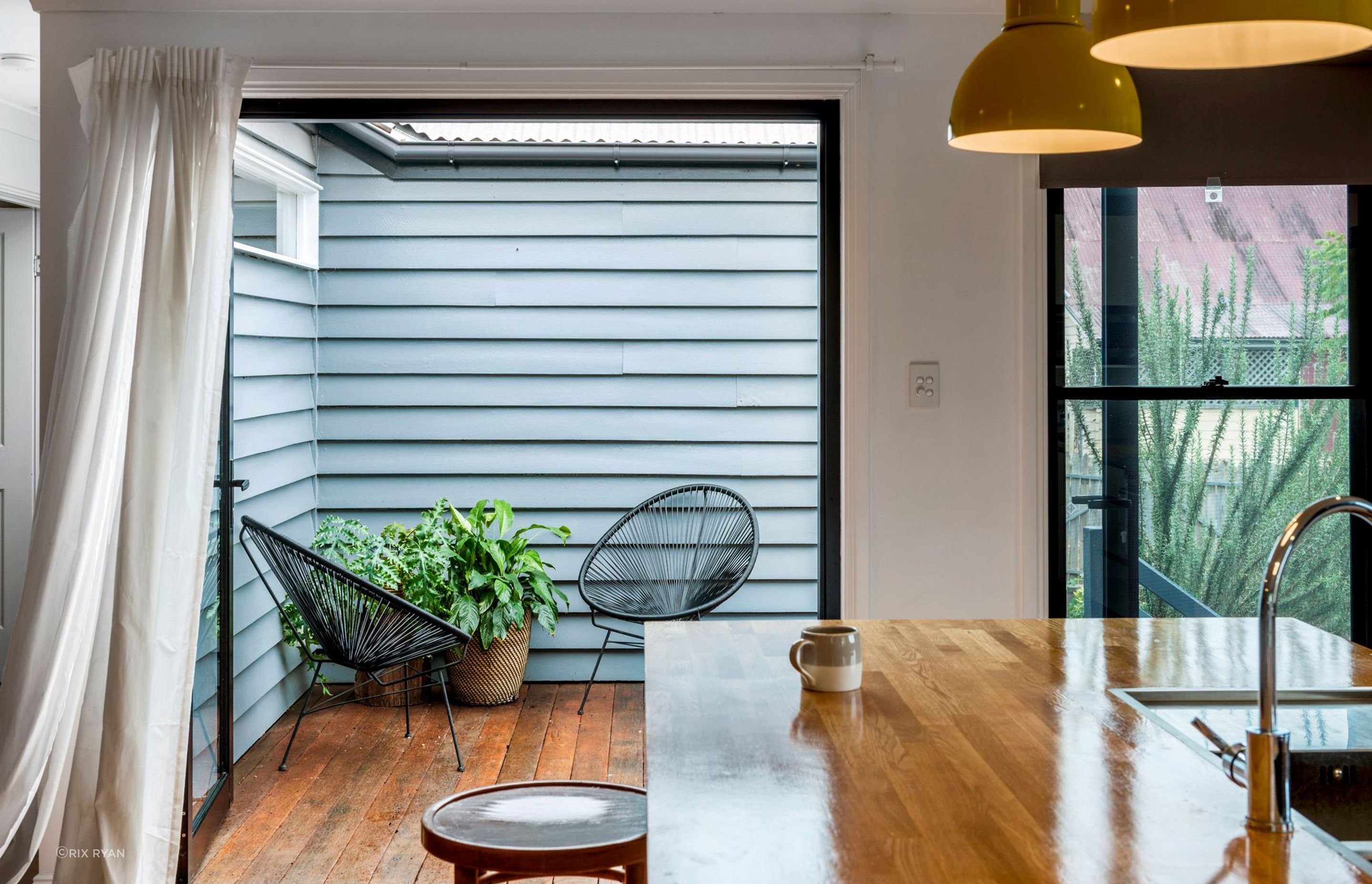 An external deck links the original cottage and the new extension, and leads you out to the kitchen garden.