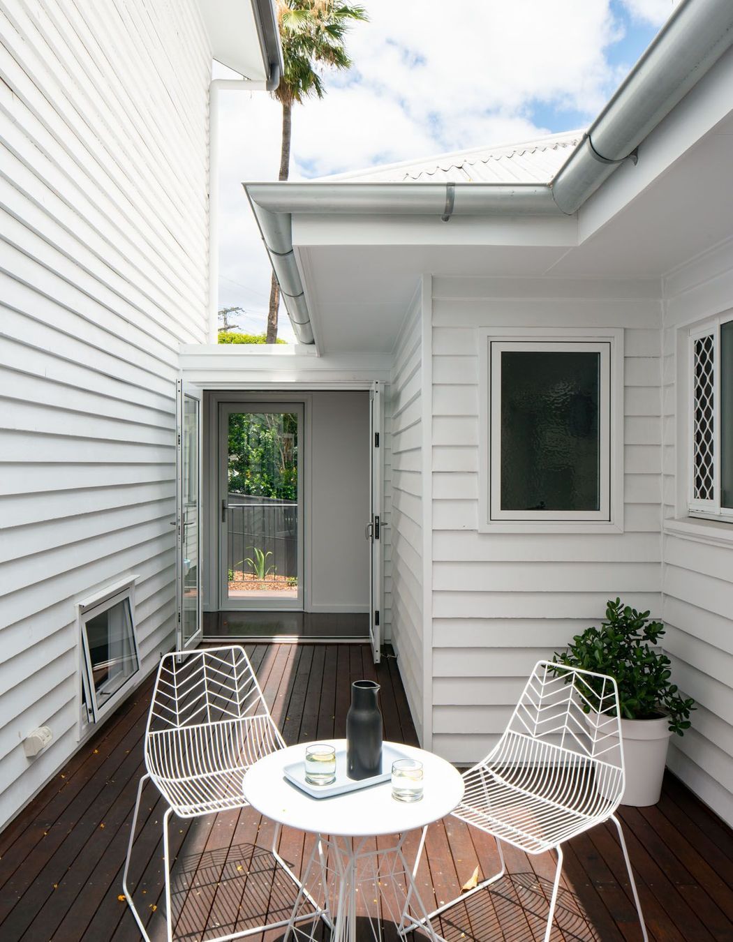 This completely secluded courtyard deck links the mastersuite, the home office and the informal entry to the house.