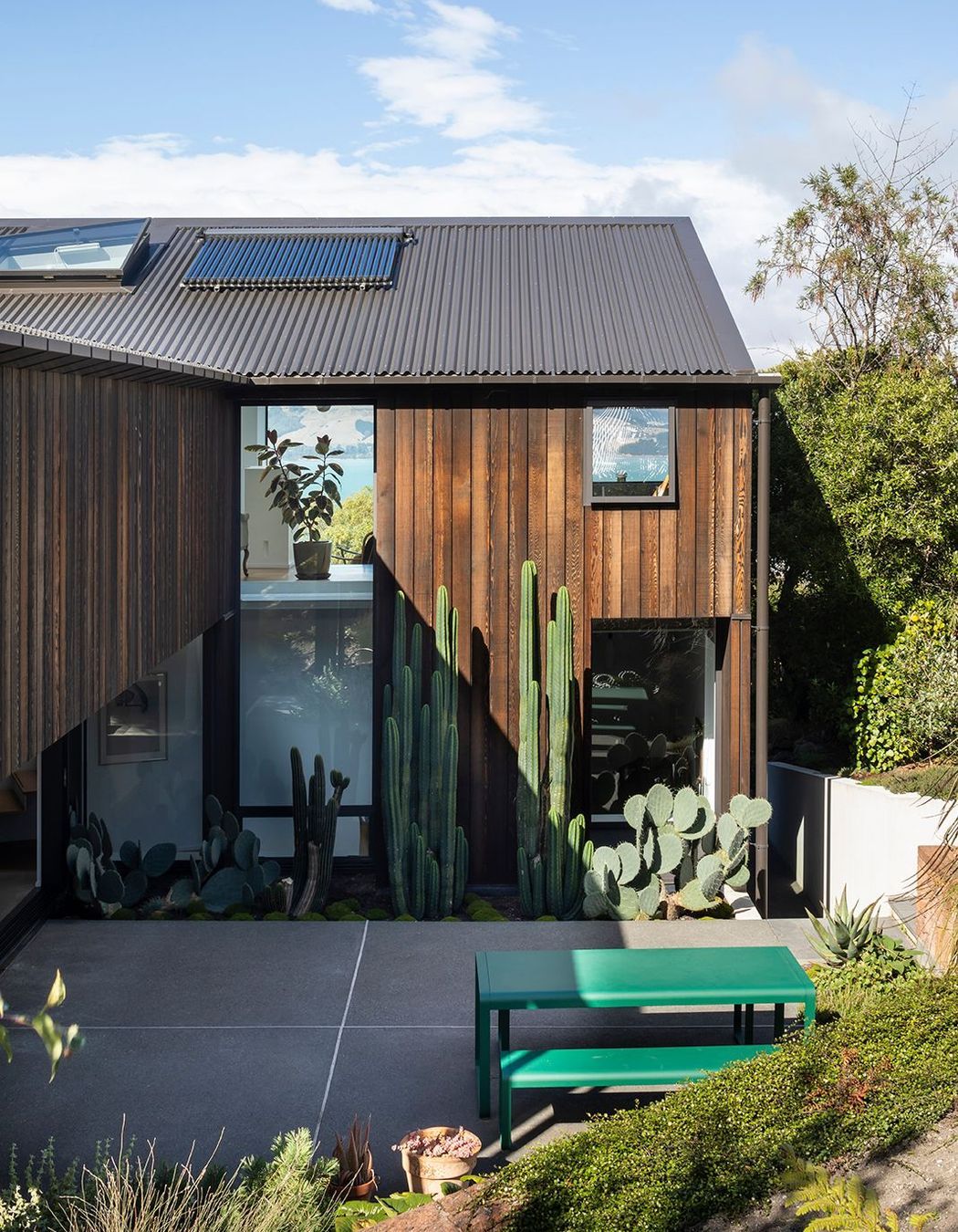 The dark stained cedar cladding was chosen for its ability to blend into the bush surrounds.