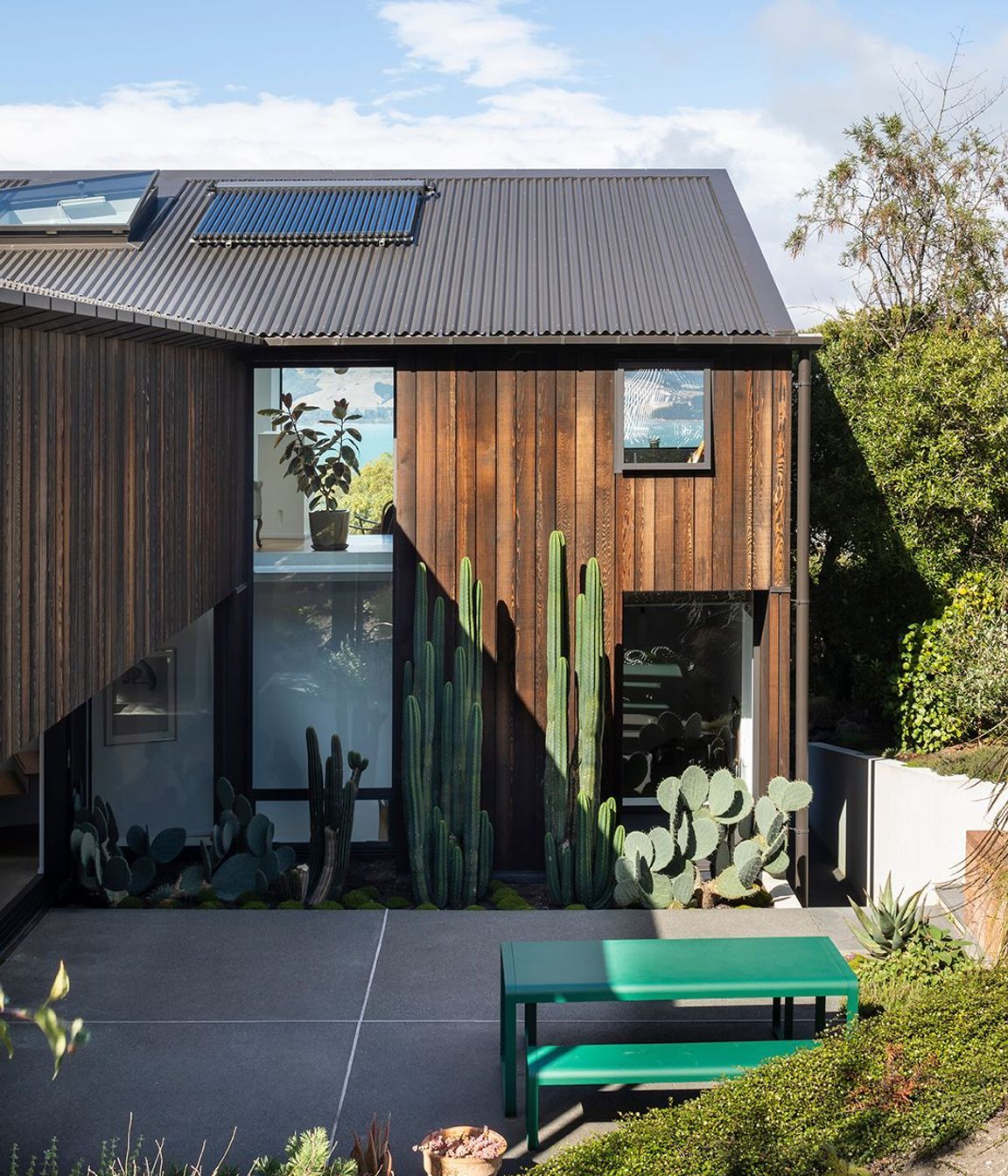 The dark stained cedar cladding was chosen for its ability to blend into the bush surrounds.