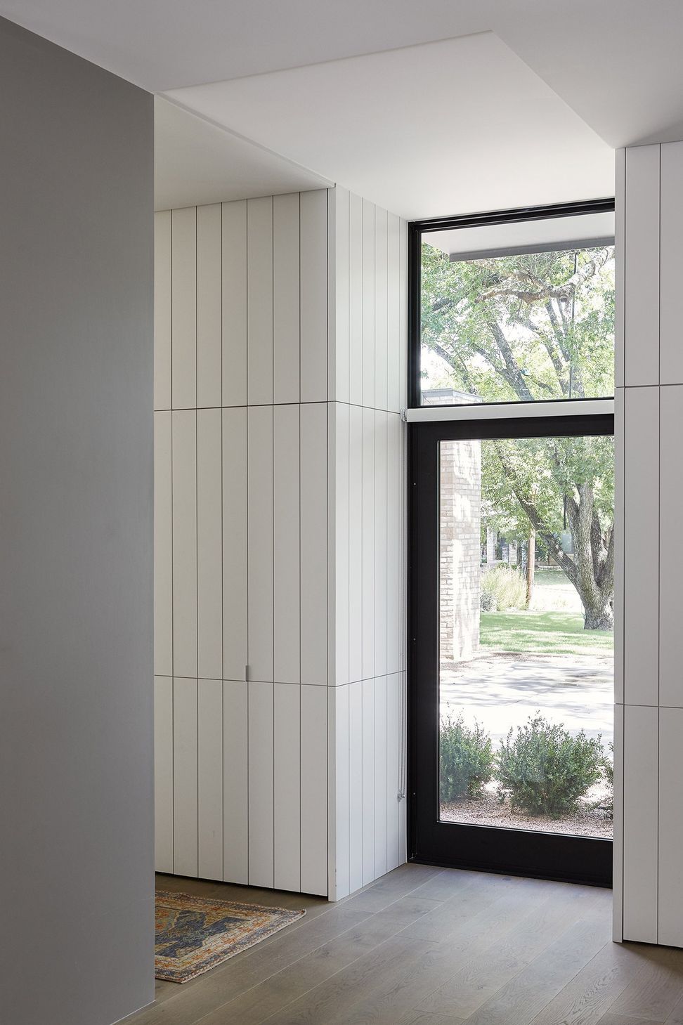 9ForestParkCuppettKilpatrickArchitectureandInteriorDesignaustin-tx-interior-hidden-millwork-wood-plank-wall.jpg