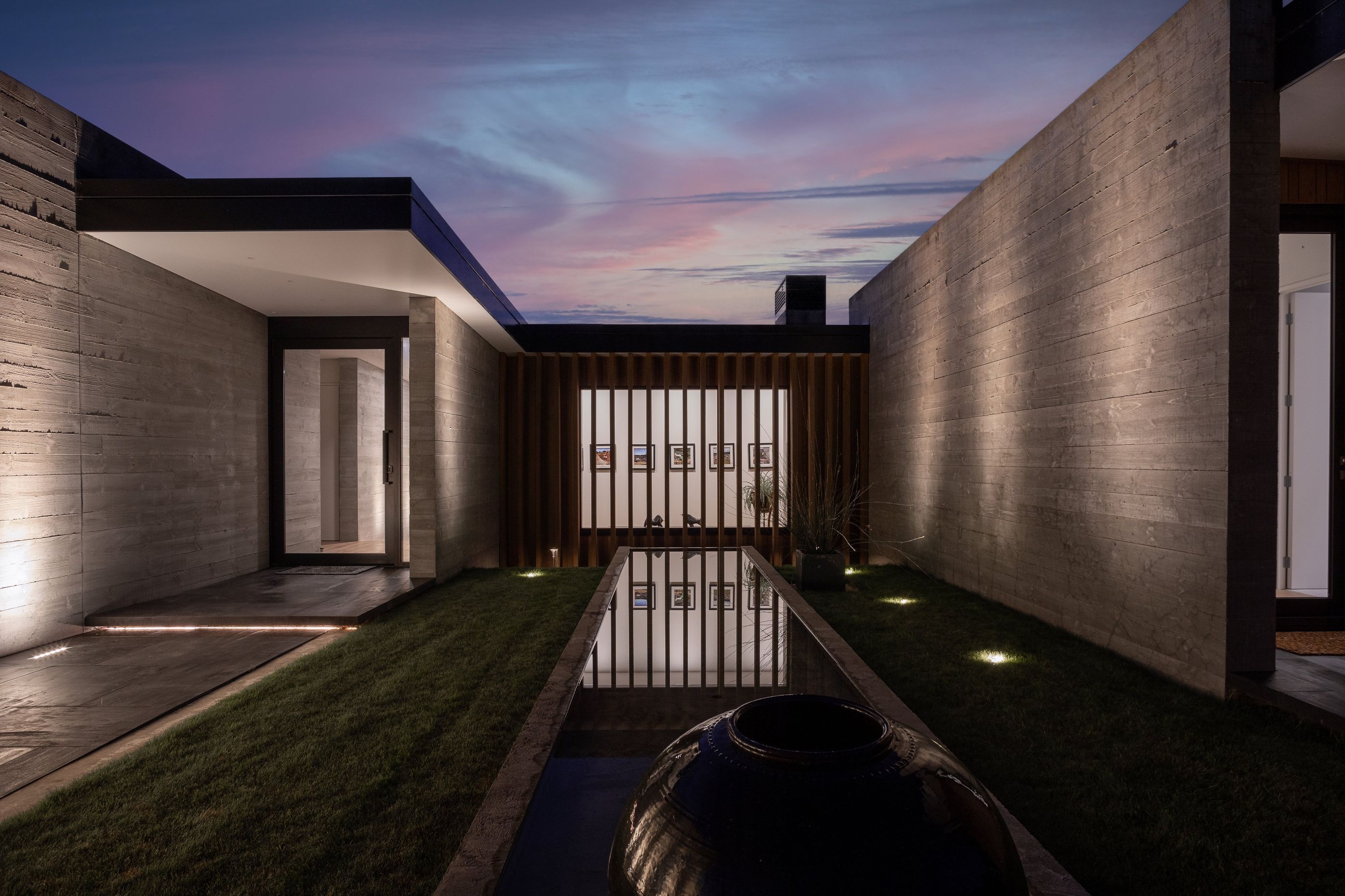 Moments of glazing are framed by the insitu-concrete walls through the entrance and breezeway.