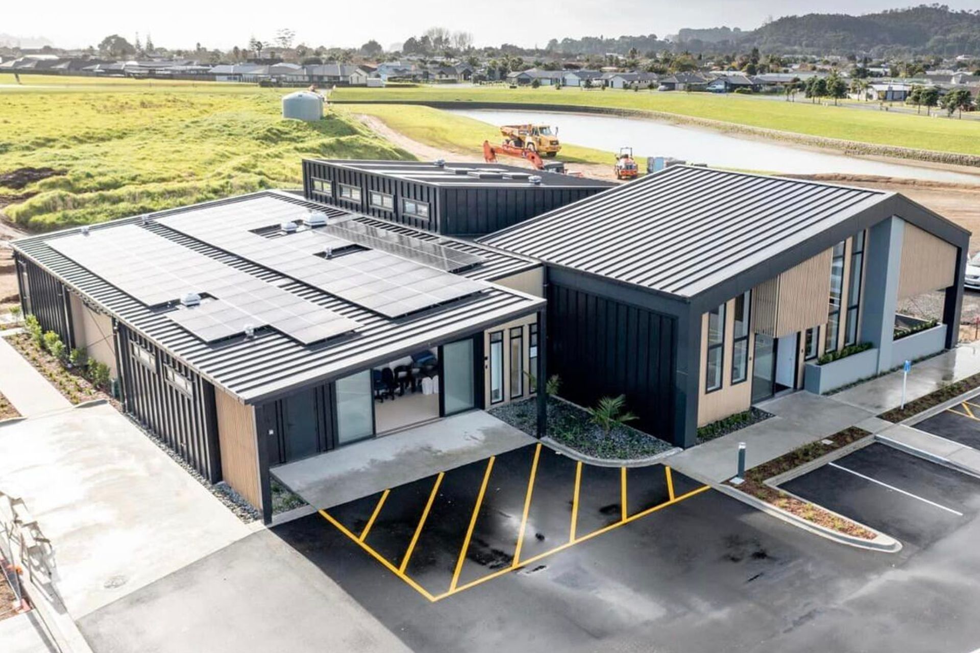 Supply and Installation of Eurostyle Spanlok 45 0.55 450 Nominal Pan (455 cover) Maxx “Flaxpod” roofing and cladding.             Photo Credit Erica Kurth Photography