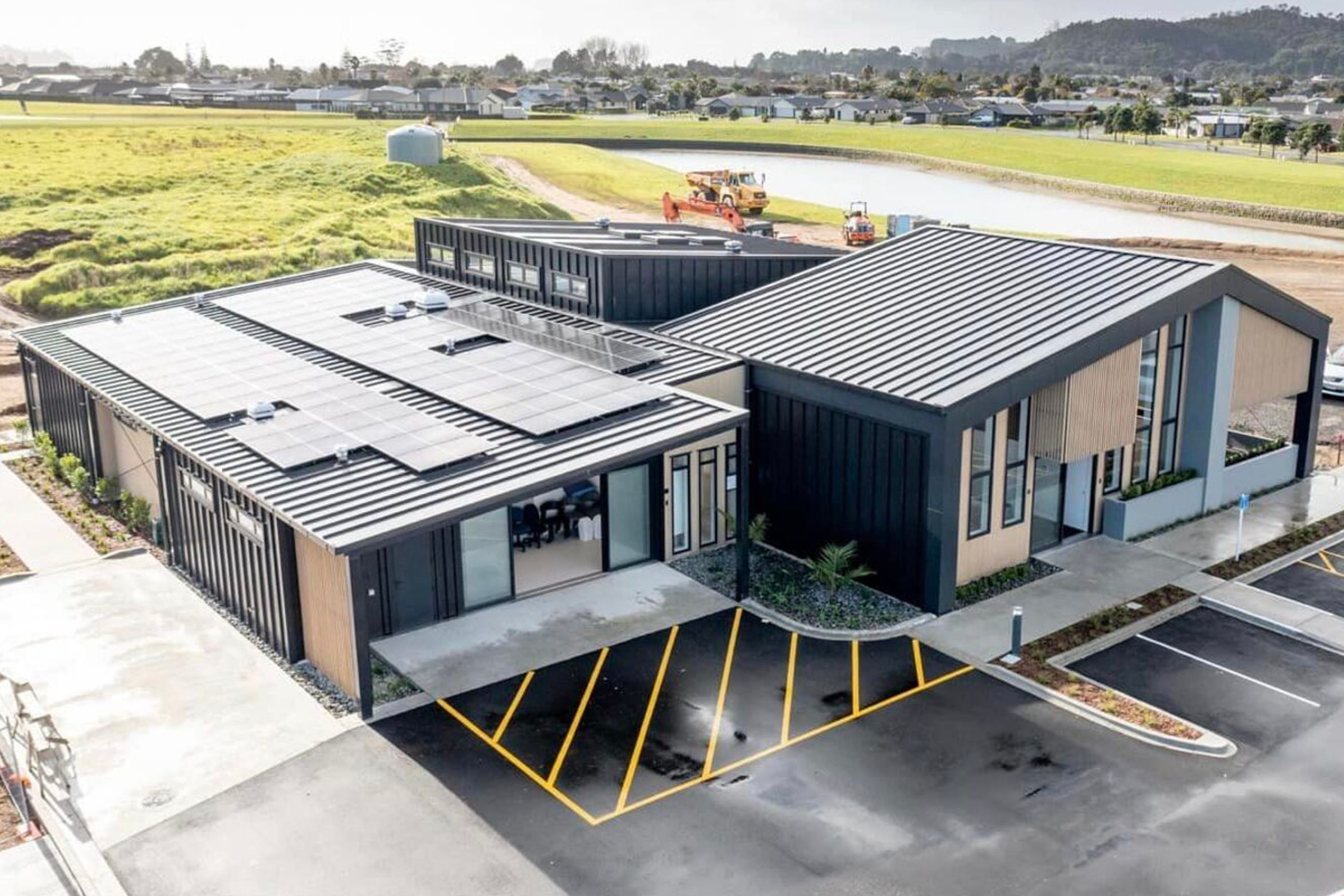 Supply and Installation of Eurostyle Spanlok 45 0.55 450 Nominal Pan (455 cover) Maxx “Flaxpod” roofing and cladding.             Photo Credit Erica Kurth Photography