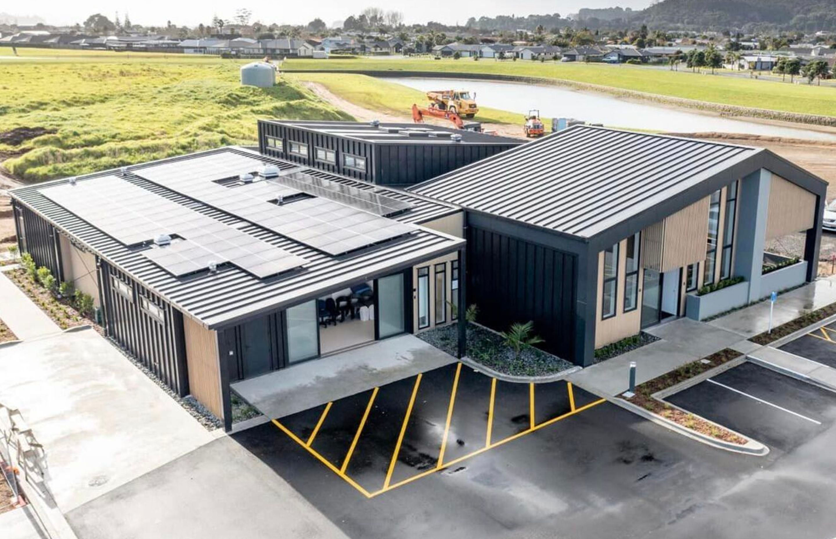 Supply and Installation of Eurostyle Spanlok 45 0.55 450 Nominal Pan (455 cover) Maxx “Flaxpod” roofing and cladding. Photo Credit Erica Kurth Photography