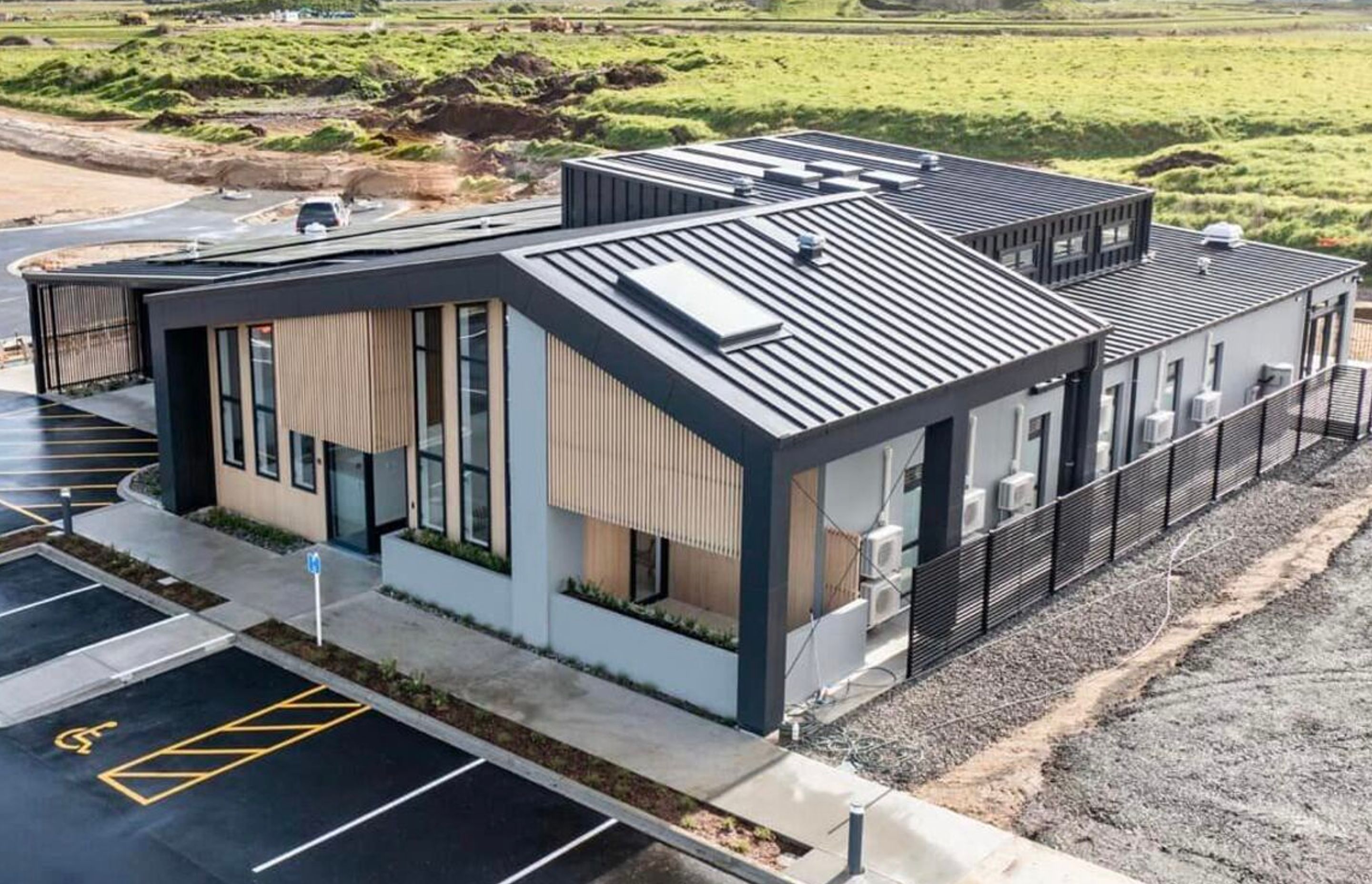 Supply and Installation of Eurostyle Spanlok 45 0.55 450 Nominal Pan (455 cover) Maxx “Flaxpod” roofing and cladding. Photo Credit Erica Kurth Photography