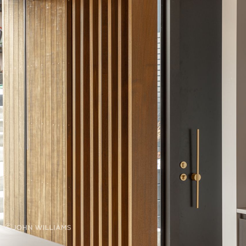 Timber fins separating the entry from the main living areas