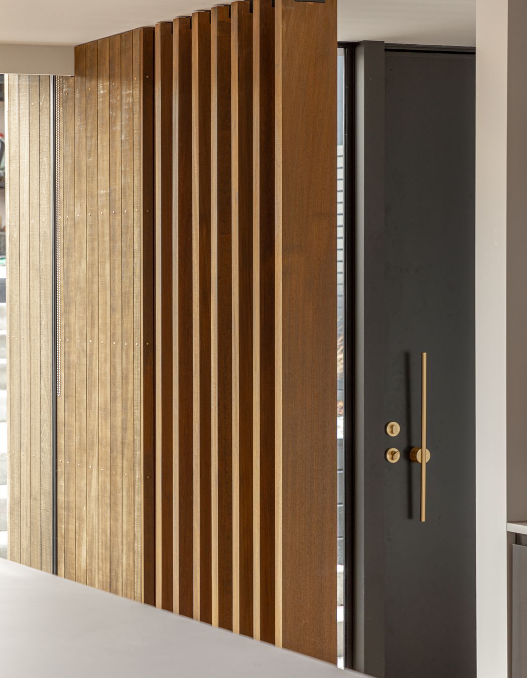 Timber fins separating the entry from the main living areas
