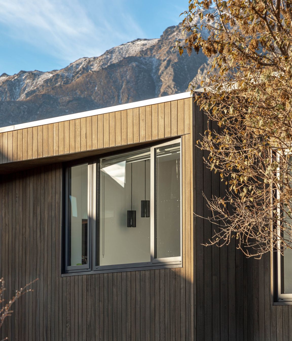 The building is defined by natural tones