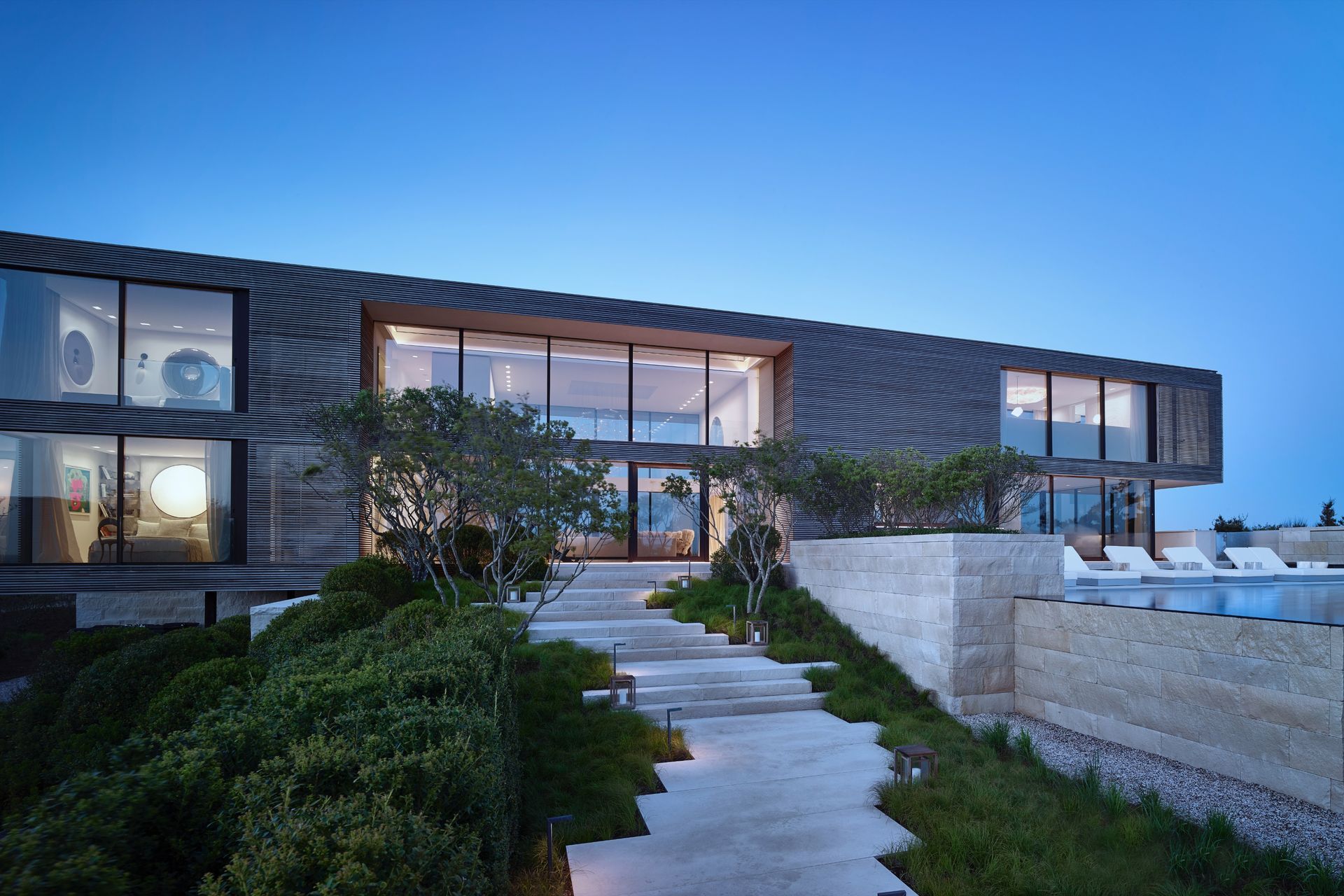 2016Carbone-Entry-garden-with-views-of-pool-and-waterfall-wall-ap-compressed.jpg
