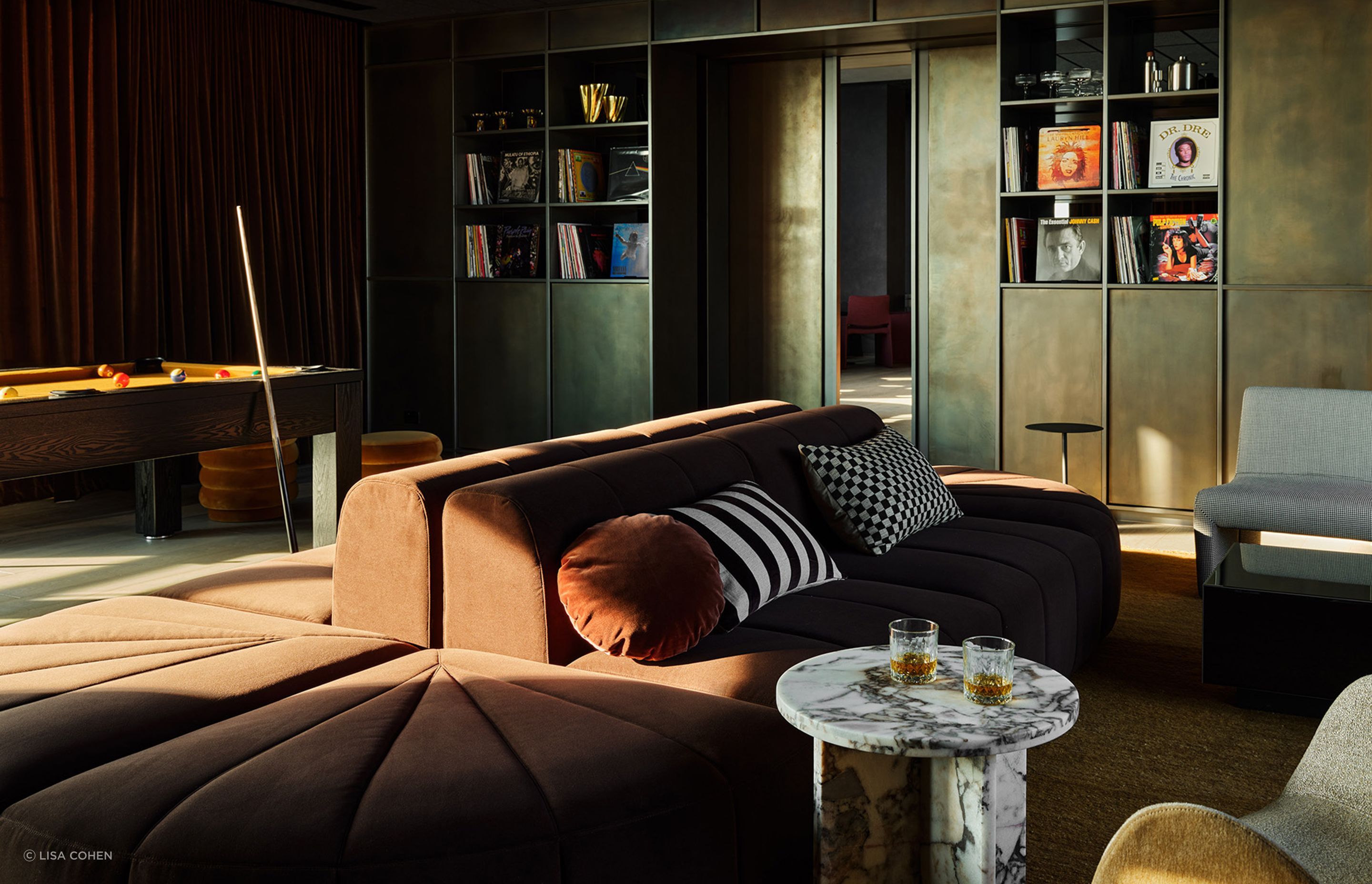 Pictured: Amara Curve Side Table, Juno Channel Modular Sofa, Kennedy Ribbed Round Ottoman