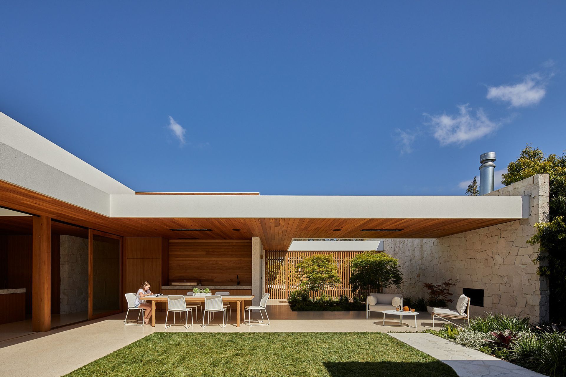 Pictured: Mauritius Island Sofa Chair, Fleur Sofa Chair, Cannes Quadra Dining Table, Marina Coast Dining Chair