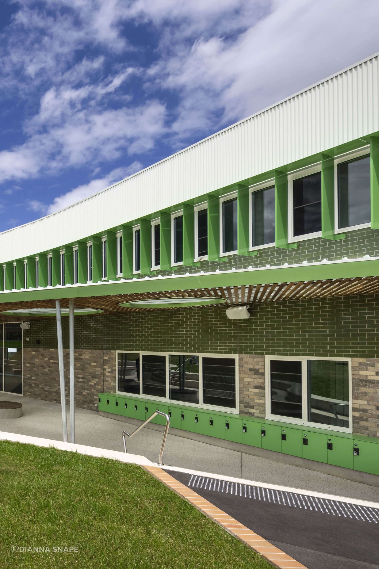 Brick-Inlay-St-Francis-xavier-curved-beehive-facade-min.jpg