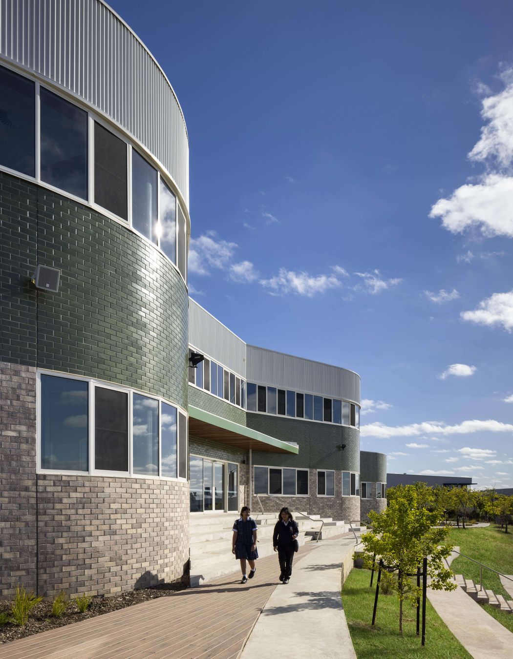 The gently curving Brick Inlay facade mimics the shape of a Beehive
