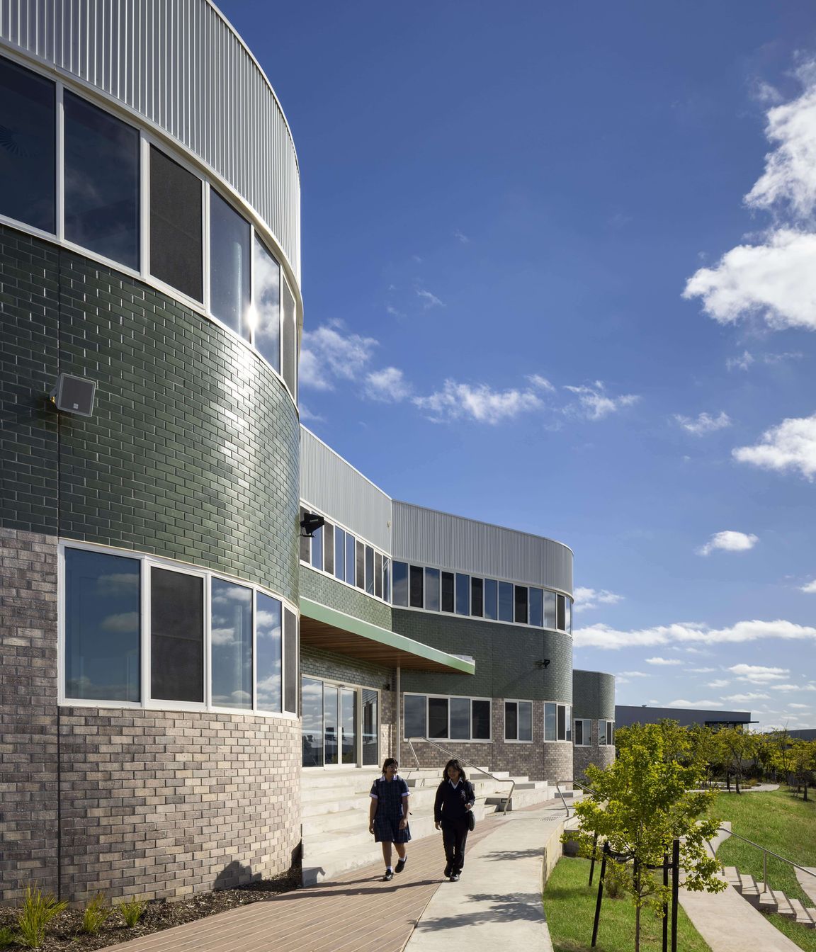The gently curving Brick Inlay facade mimics the shape of a Beehive