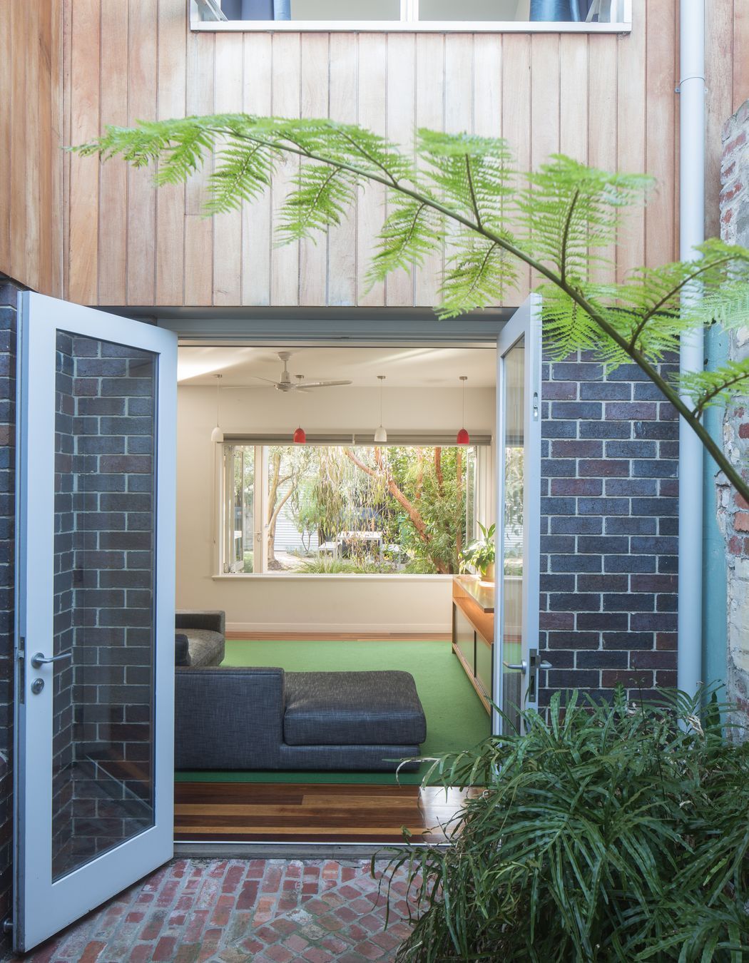 Second storey timber cladding and large window